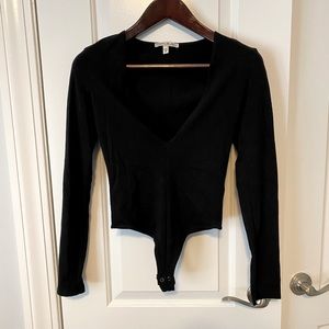 Express deep V body suit! Size cos. Worn once.